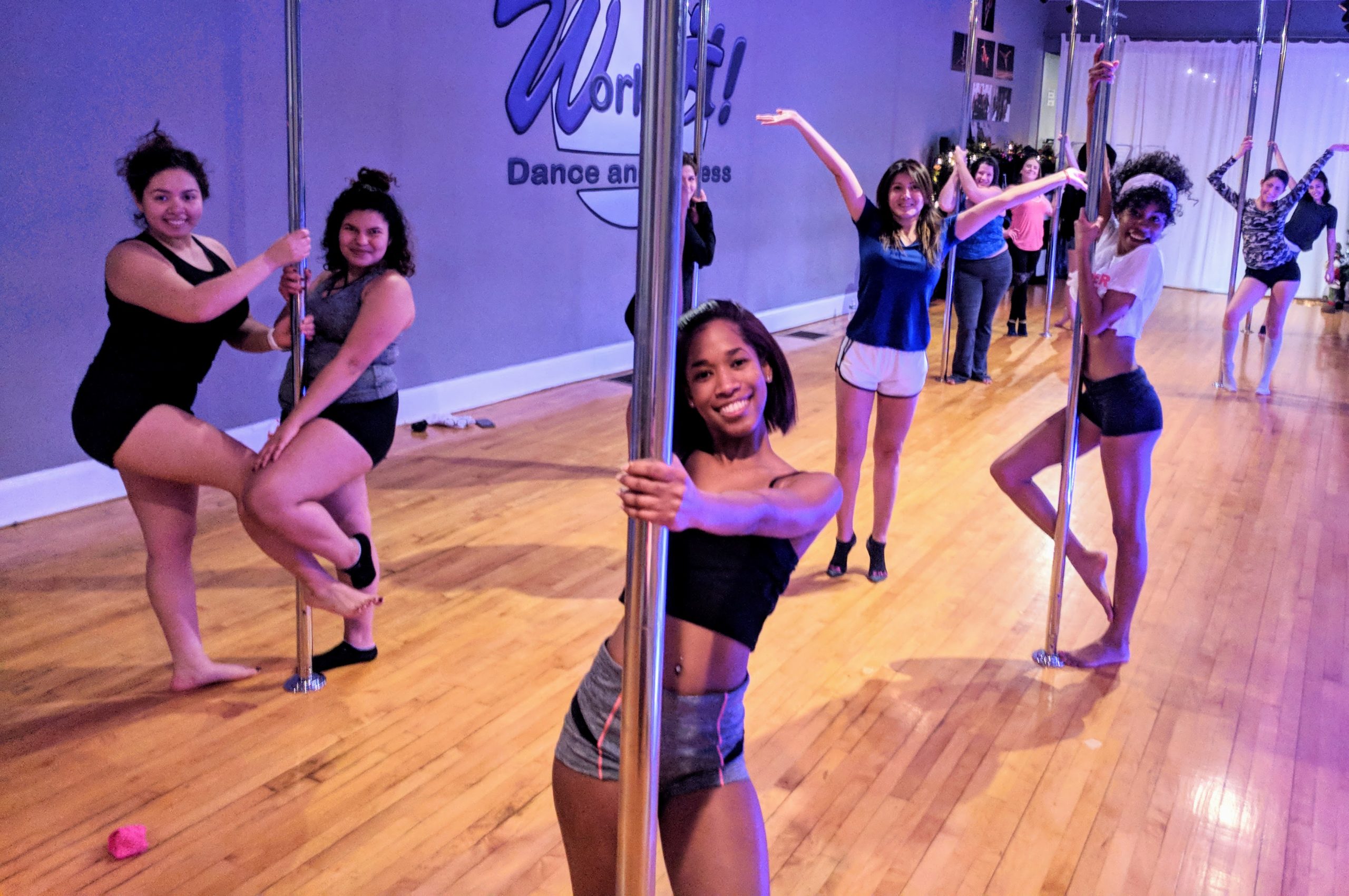 women in pole dancing class at Work It, Norwalk, CT